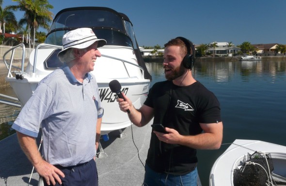 ABC radio interviewing an oyster gardener.